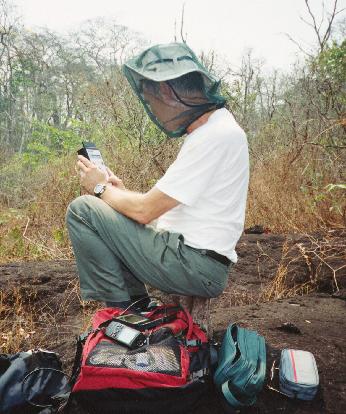 Forrest Mims studies smoke at Brazil's Cristalino River. Photo by Brad White.